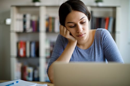 Employee completing a challenging training course at home