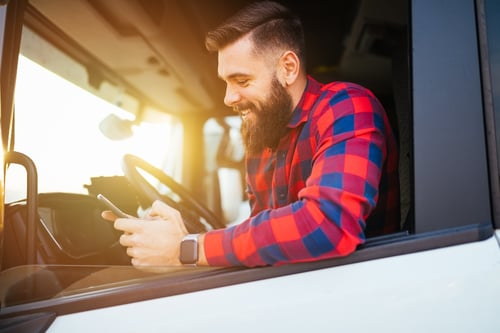 Engaged deskless employee driving a truck