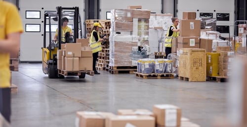 Deskless employees doing audits in a warehouse